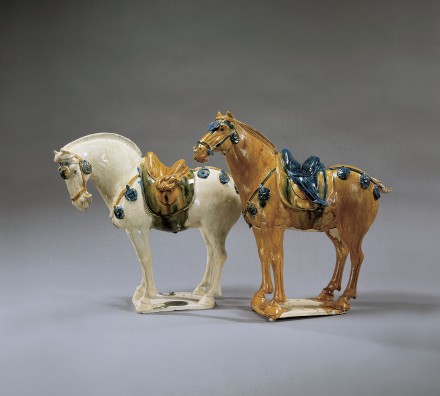 A PAIR OF SANCAI AND BLUE GLAZED POTTERY HORSES