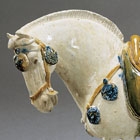 A PAIR OF SANCAI AND BLUE GLAZED POTTERY HORSES