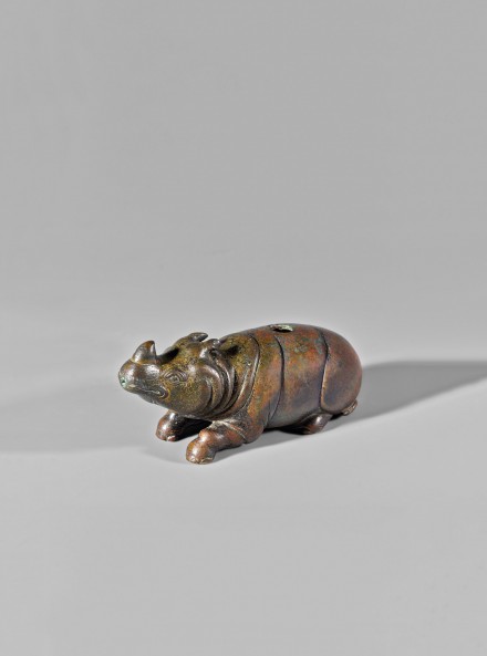 AN EARLY BRONZE RHINOCEROS-FORM WATERDROPPER