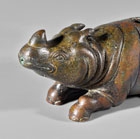 AN EARLY BRONZE RHINOCEROS-FORM WATERDROPPER