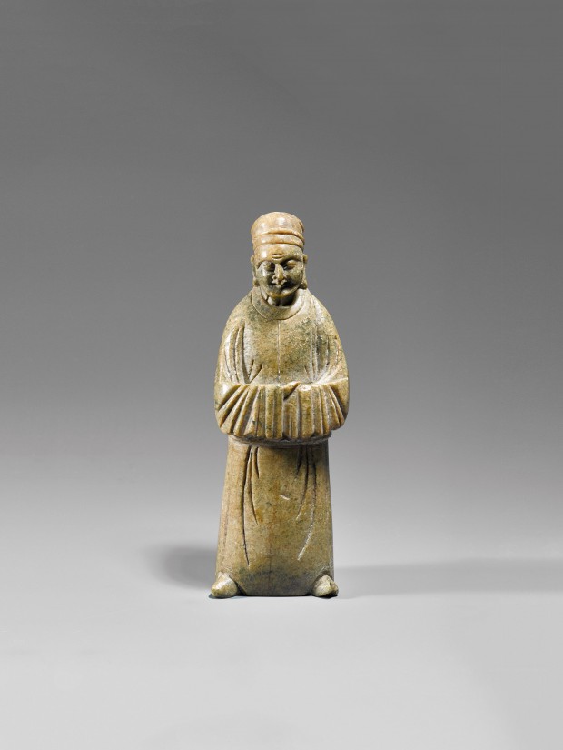 AN EARLY SOAPSTONE CARVING OF A SAGE