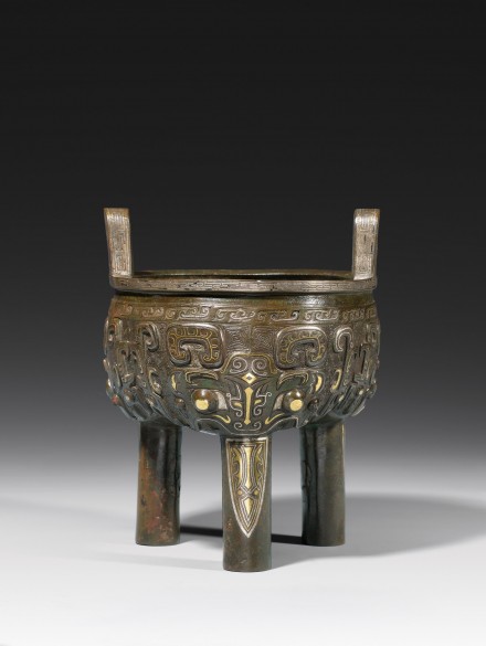 A GOLD- AND SILVER-INLAID ARCHAISTIC BRONZE TRIPOD CENSER