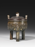 A GOLD- AND SILVER-INLAID ARCHAISTIC BRONZE TRIPOD CENSER