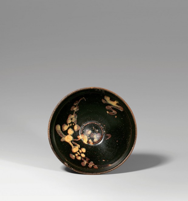 A PAINTED JIZHOU ‘MOON AND PRUNUS’ TEA BOWL