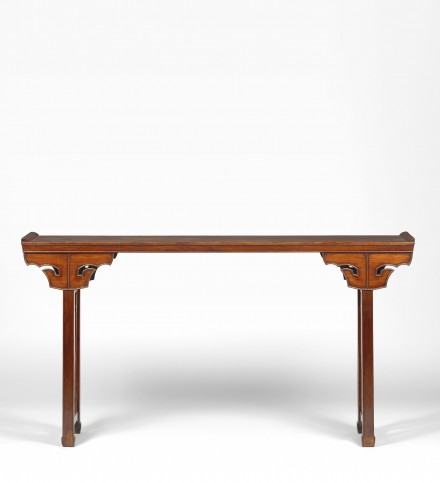 A HUANGHUALI TABLE WITH ‘TAOTIE’ SPANDRELS