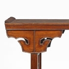 A HUANGHUALI TABLE WITH ‘TAOTIE’ SPANDRELS