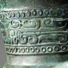 A BRONZE TRIPOD RITUAL VESSEL (JIA)