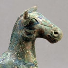 A BRONZE FIGURE OF A STALLION