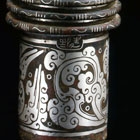 A PAIR OF INSCRIBED SILVER-INLAID BRONZE CHARIOT FITTINGS