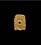 AN INSCRIBED AND INLAID GOLD OPENWORK PLAQUE