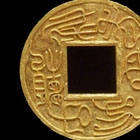 AN INSCRIBED GOLD MEDALLION-FORM AMULET