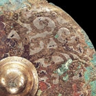 A GILT BRONZE DRAGON-HEAD HUANG AND A BI DISC