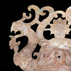 A GILT BRONZE PLAQUE IN THE FORM OF XIWANGMU