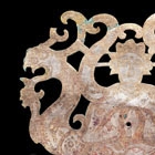 A GILT BRONZE PLAQUE IN THE FORM OF XIWANGMU