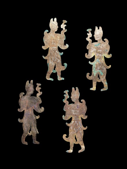 FOUR ENGRAVED GILT BRONZE FIGURAL PLAQUES