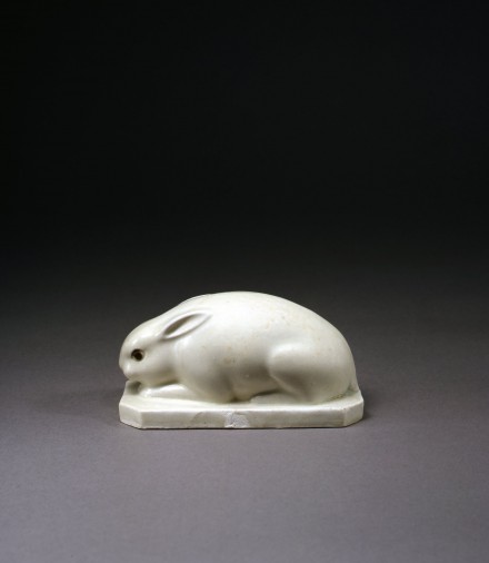 A WHITE PORCELAIN FIGURE OF A RABBIT