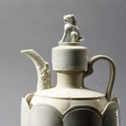 A WHITE PORCELAIN EWER AND COVER WITH WARMING BASIN, CUPS AND CUPSTANDS