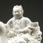 A MOULDED DINGYAO WHITE PORCELAIN FIGURAL EWER