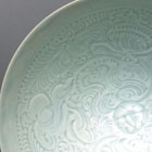 A CARVED YINGQING  PORCELAIN ‘BOYS AND FLOWERS’ BOWL