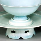 A YINGQING PORCELAIN FLOWER-SHAPED WINECUP AND STAND