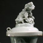 AN ELABORATELY DECORATED YINGQING PORCELAIN WINE EWER AND COVER