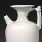 AN EWER WITH TRUMPET NECK