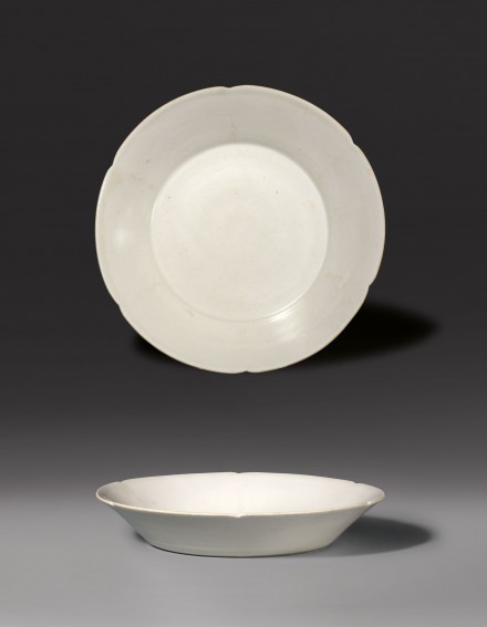 A DISH WITH LOBED RIM