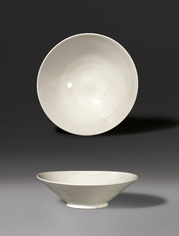 A THINLY POTTED CONICAL BOWL