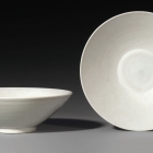 A PAIR OF ROUNDED CONICAL BOWLS