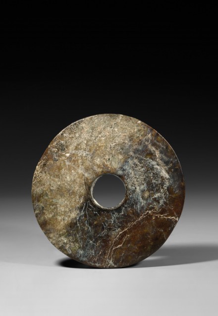 A LARGE NEOLITHIC DARK GREEN JADE BI DISC