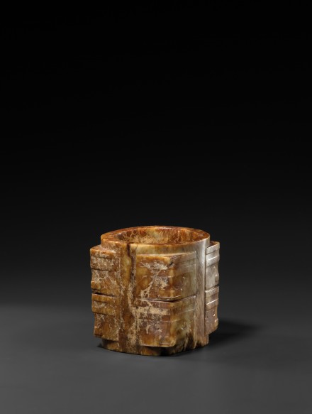 A NEOLITHIC RUSSET-BROWN AND YELLOW JADE CONG