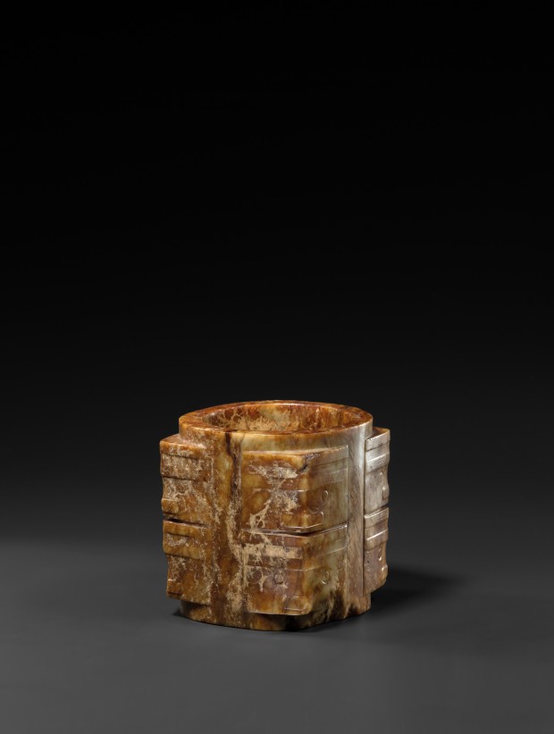 A NEOLITHIC RUSSET-BROWN AND YELLOW JADE CONG