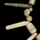 A NECKLACE OF NEOLITHIC JADE BEADS