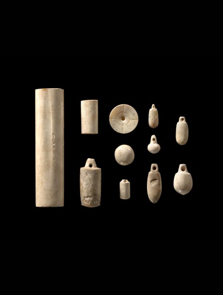 A GROUP OF SMALL NEOLITHIC JADE ORNAMENTS