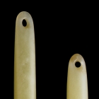 TWO LONG ROD SHAPED JADE ORNAMENTS