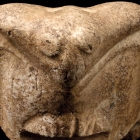 A NEOLITHIC WHITE MARBLE OWL FORM PENDANT