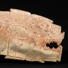 AN INCISED JADE TIGER FORM PLAQUE