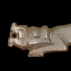 A YELLOWISH-GREEN JADE DRAGON FORM PENDANT