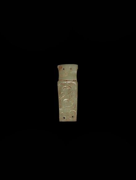 A WHITE JADE HANDLE SHAPE PLAQUE