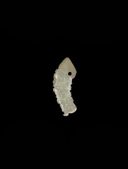 A WHITE JADE HUMAN FIGURE AND DRAGONS PENDANT