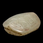 A JADE TORTOISE SHELL FORM BEAD