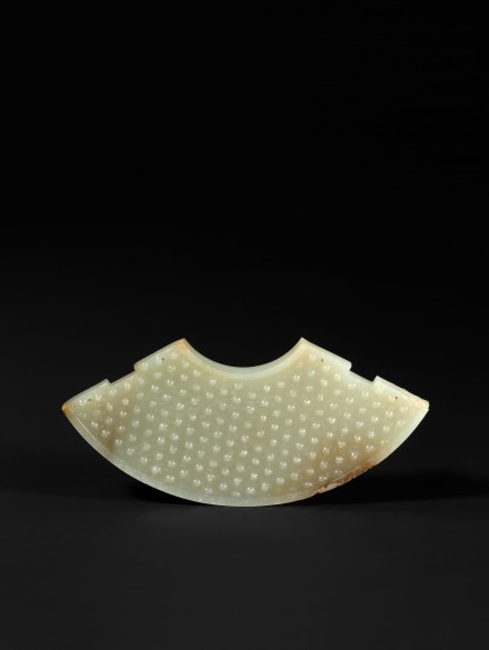 A WHITE JADE ARC SHAPED PENDANT (HUANG)