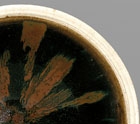 A RUSSET-SPLASHED BLACK-GLAZED TEA BOWL WITH WHITE RIM