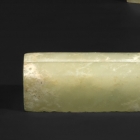 A THINLY CARVED JADE TUBULAR FITTING