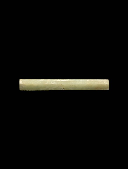A THINLY CARVED JADE TUBULAR FITTING