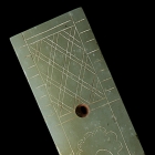 AN INCISED JADE RULER