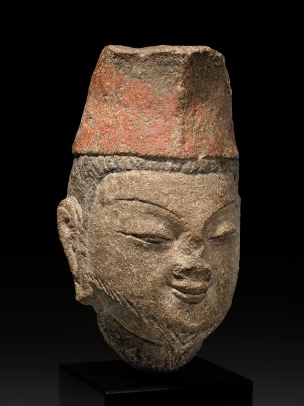 A PAINTED SANDSTONE HEAD OF VIMALAKIRTI (WEI MO)