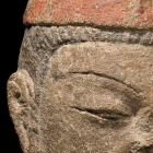 A PAINTED SANDSTONE HEAD OF VIMALAKIRTI (WEI MO)