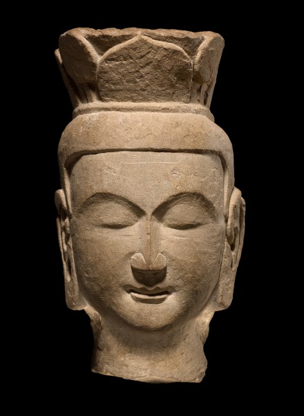 A LIMESTONE HEAD OF A BODHISATTVA