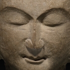 A LIMESTONE HEAD OF A BODHISATTVA